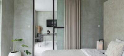 single family home bedroom with a sliding glass door