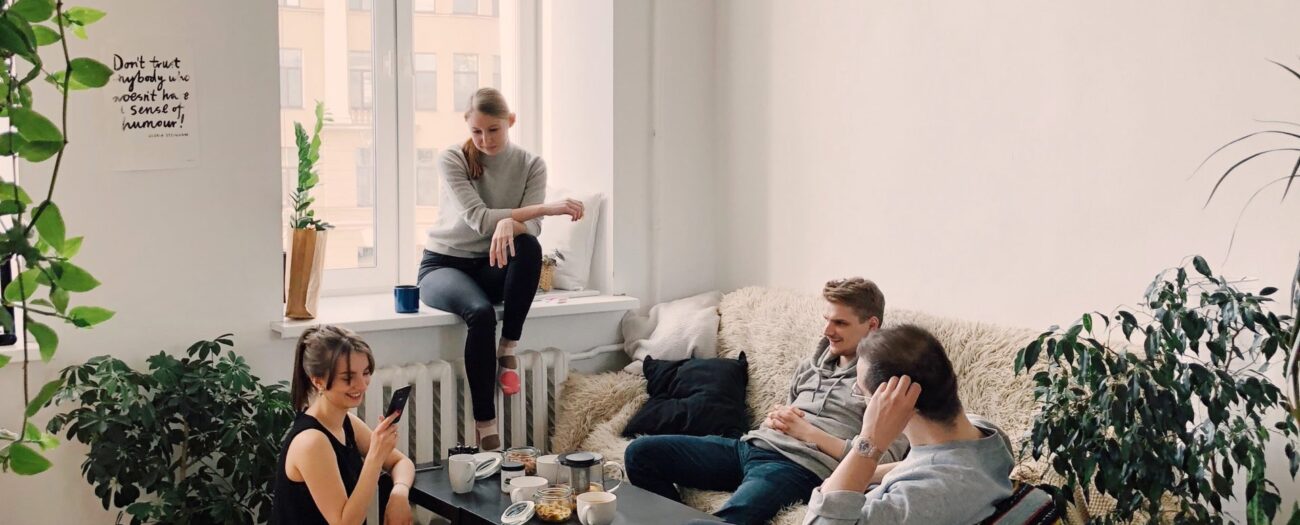 people in multifamily apartment living room